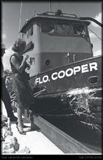 Florence Cooper christening the boat named after herself. Click to enlarge