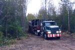 The boat is examined, information and photos sent to Steve Briggs of Owen Sound, he confirms that it is a Russel Brothers Aliigator from the mid 1920's. A road must be cleared.